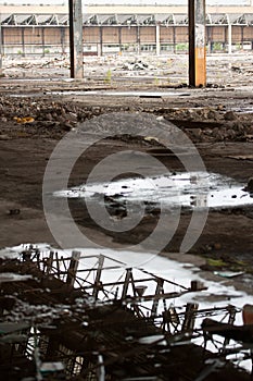 Old abandoned factory - reflected in a puddle