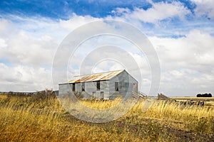 Old abandoned farm in field. Australia, Victoria