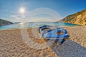 Old Abandoned Fishermen Boat at Sunset Myrtos Beach in Kefalonia, Greece