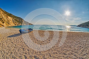 Old Abandoned Fishermen Boat at Sunset Myrtos Beach in Kefalonia, Greece