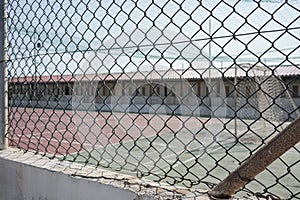 Old abandoned football field and soccer goal