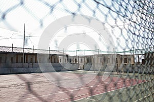 Old abandoned football field and soccer goal