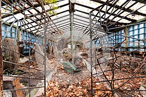 Old abandoned glasshouse or hothouse at Pripyat - ghost city near Chernobyl exclusion zone, Ukraine