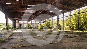 Old abandoned hangar of the military airbase photo