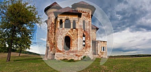 Old abandoned haunted house and sky in Transylvania with clouds