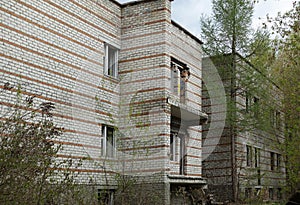 Old abandoned high-rise building. Crumbling residential building