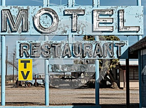 Old abandoned highway motel and restaurant sign