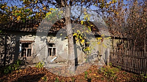 An old abandoned house with broken Windows. Abandoned house in the exclusion zone in Chernobyl, the city of Pripyat.