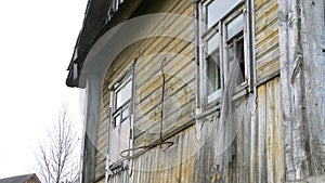 An old abandoned house with broken Windows. Abandoned house in the exclusion zone in Chernobyl, the city of Pripyat. 4k