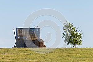 Old abandoned house or chalet lodge in steppe