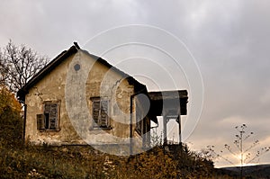 An old abandoned house on a hill