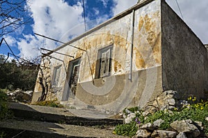 Old abandoned house in the traditional village Chamaitoulo, Crete, Greece