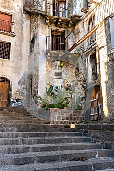 Old abandoned houses in a staircase road, Castiglione di Sicilia, ITA