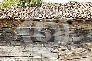 Old abandoned hut with clay tiles captured on a sunny day