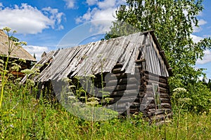 An old abandoned hut on the shore. Lake Tagasuk. Krasnoyarsk Territory, Siberia, Russia