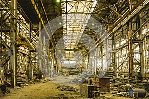 An old abandoned industrial workshop after metallurgical production .