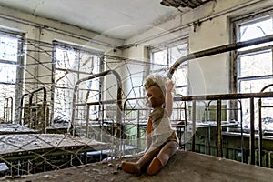 Old abandoned kindergarten in the exclusion zone of the Chernobyl nuclear disaster. Abandoned toys and destroyed old building