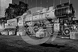 Old and abandoned locomotive in black and white