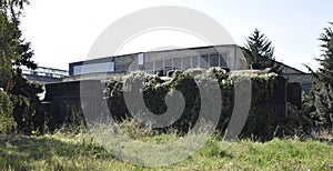 Old abandoned overgrown railroad car