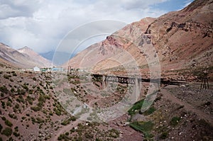 Abandoned railroad bridge across Las Cuevas River in Andes Mounrains