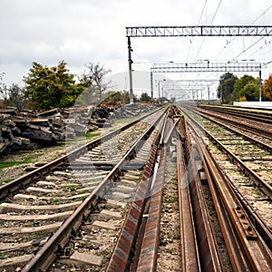 Old abandoned railway, broken rails, broken sleepers