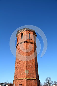 Old abandoned red bricks train station tower