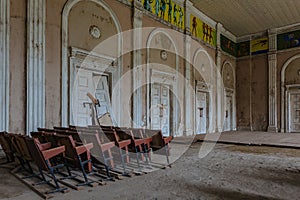 Old abandoned ruined stage theater or cinema hall