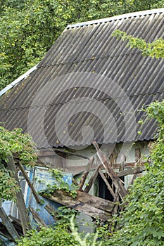 Old abandoned rural house, with signs of destruction from lack of care