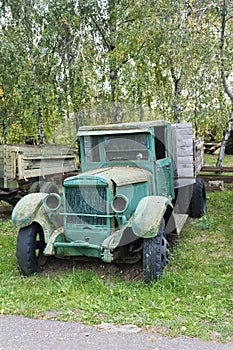 Old abandoned rusted green truck