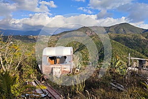 Old abandoned rusted roulotte Rv van