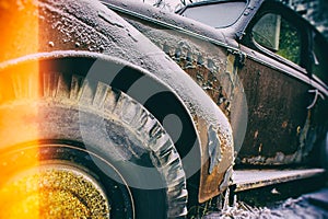 Old abandoned rusty car