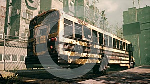 An old abandoned rusty school bus stands in the middle of the road in a deserted city. The image for historical, retro