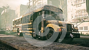 An old abandoned rusty school bus stands in the middle of the road in a deserted city. The image for historical, retro