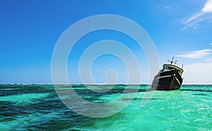 Old abandoned ship aground