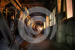 Old abandoned silo elevator with rusty equipment left