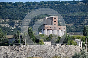An old abandoned Soviet grain terminal. grain elevator