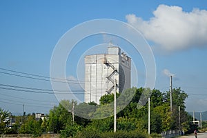 An old abandoned Soviet grain terminal. grain elevator