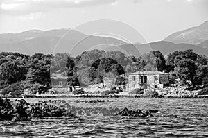 Old abandoned stone houses on a greek small island named Lichadonisia.