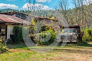 Old abandoned truck and building