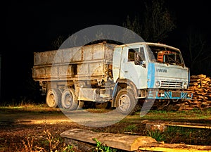 Old abandoned truck covered in rust. Rusty truck outdoors. Deteriorated truck