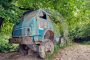 Old abandoned truck in the forest