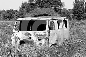 old and abandoned van is standing and rotting for eternity