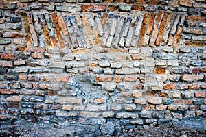Old abandoned wall with bricked up window