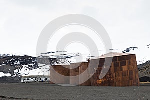 Old abandoned whaler`s station and hut, whaler`s bay, deception island, antarctica photo