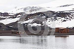 Old abandoned whaler`s station and hut, whaler`s bay, deception island, antarctica photo