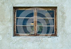 Old abandoned window, detail of a window of a house photo