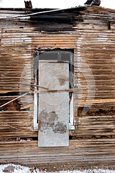 Old abandoned window, detail of a window of a photo