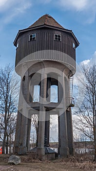 Old abandoned wood water tower. Central Sweden