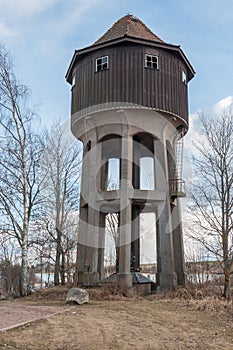 Old abandoned wood water tower. Central Sweden