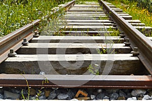 Old abandoned wooden and iron train tracks